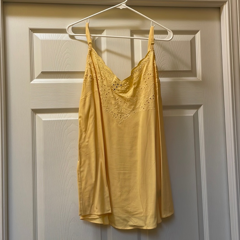 Plus size yellow tank top with crochet detail at the neckline